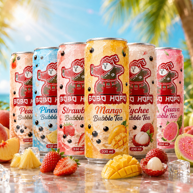 Bobo Hopo 330ml canned bubble tea range with peach, pineapple, strawberry, mango, lychee and guava flavours displayed with fresh tropical fruits.