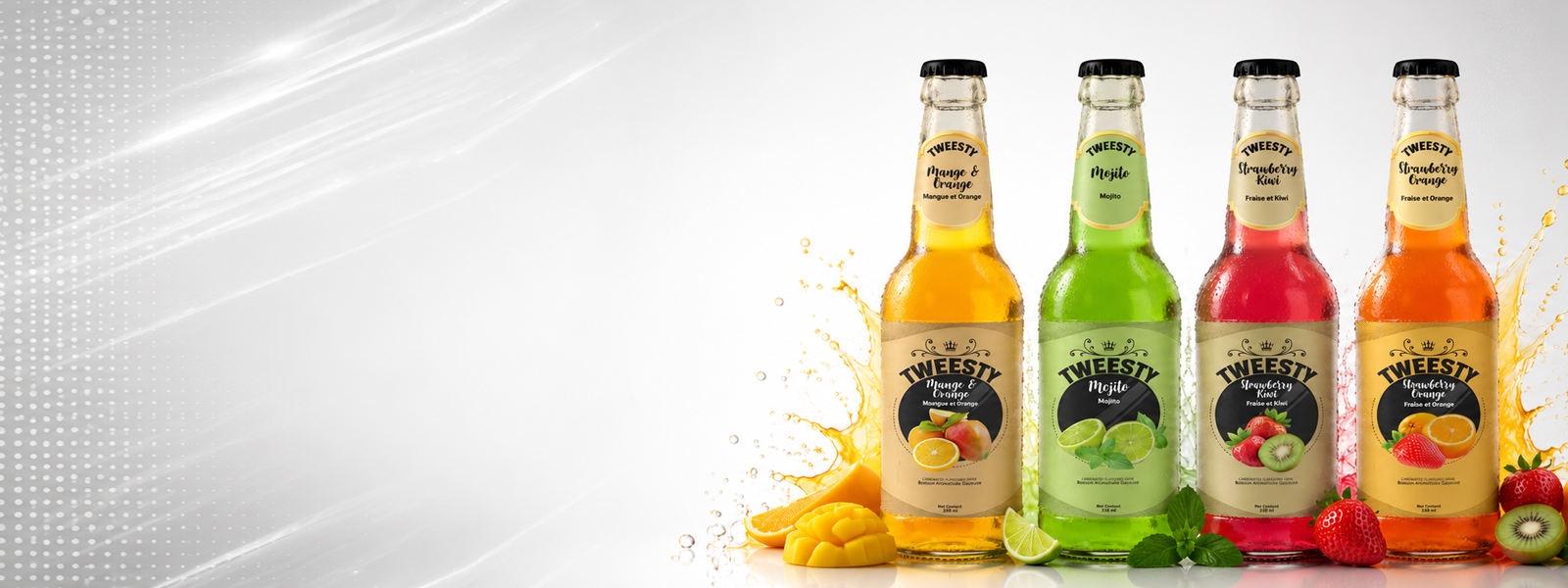 Tweesty mango orange, mojito, strawberry kiwi, and strawberry orange fruit drinks in 330ml glass bottles with fresh fruit.
